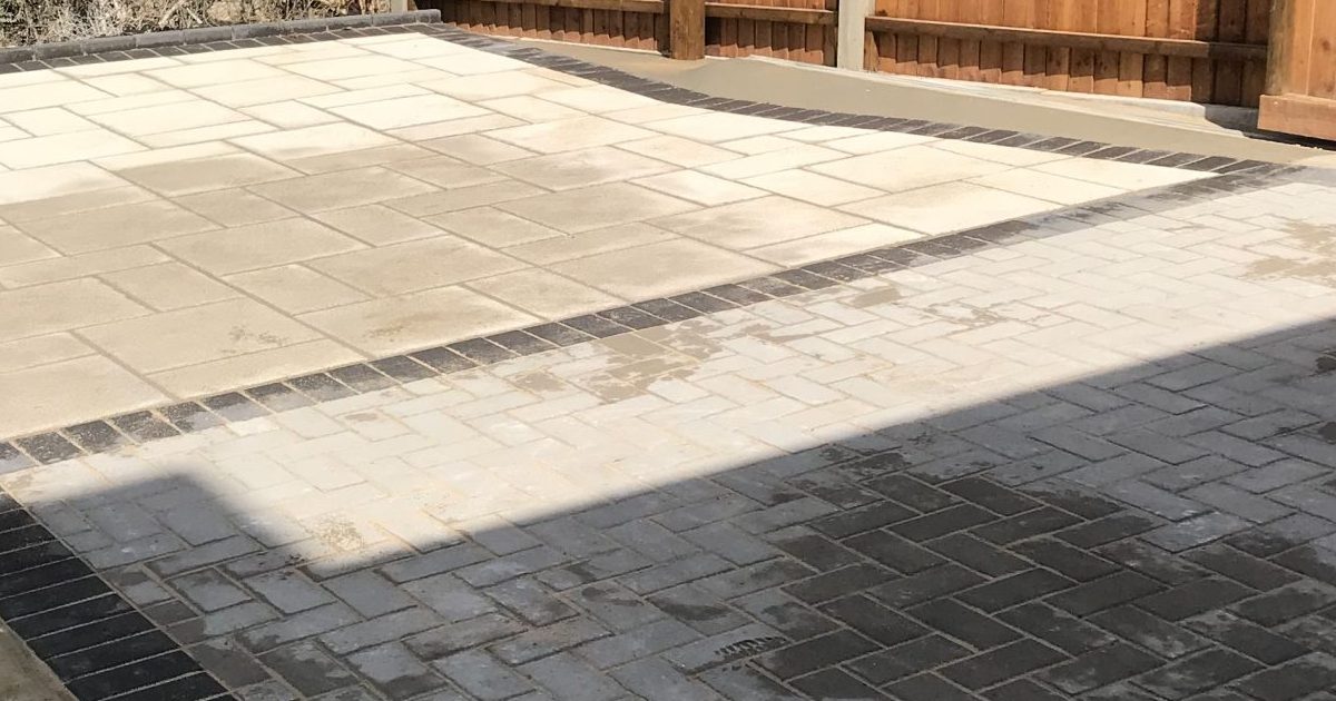 Sandstone patio and closeboard fencing installed by D&A Contractors in Kent