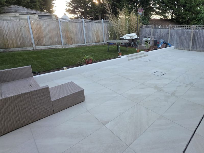 A full garden makeover with porcelain paving, a new lawn and planting