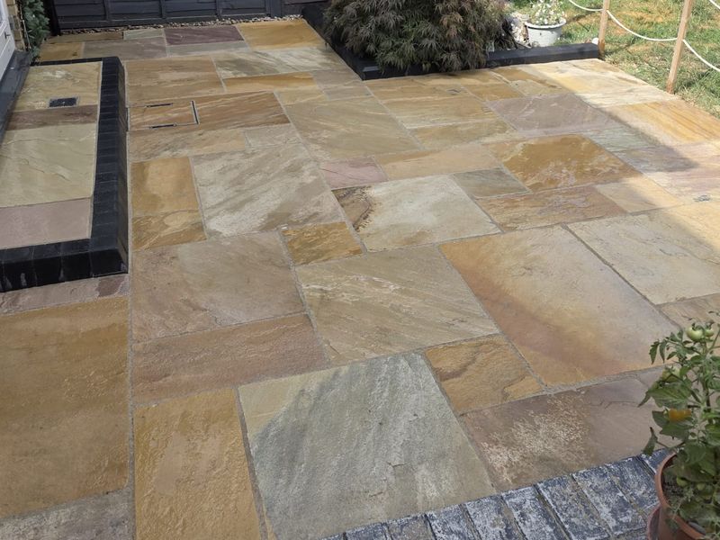 Indian sandstone patio paving in mixed buff and grey tones